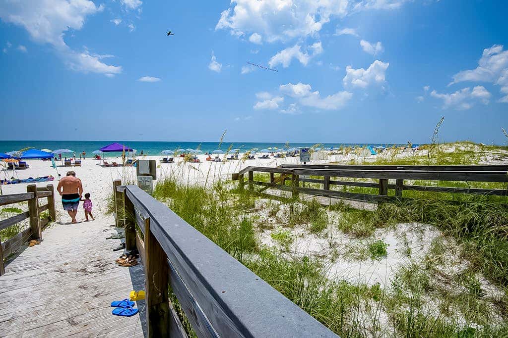 Dreamy beach condo with water views, balcony, pool & beach access