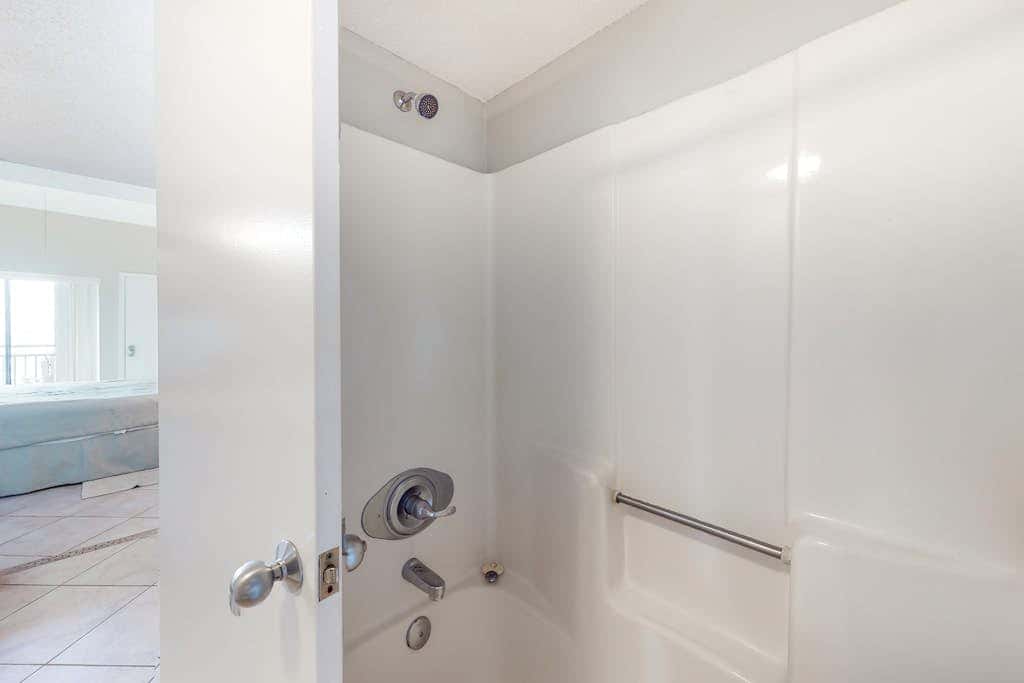 Two-story, Gulf-front condo with a pool, WiFi, washer,dryer, & central AC