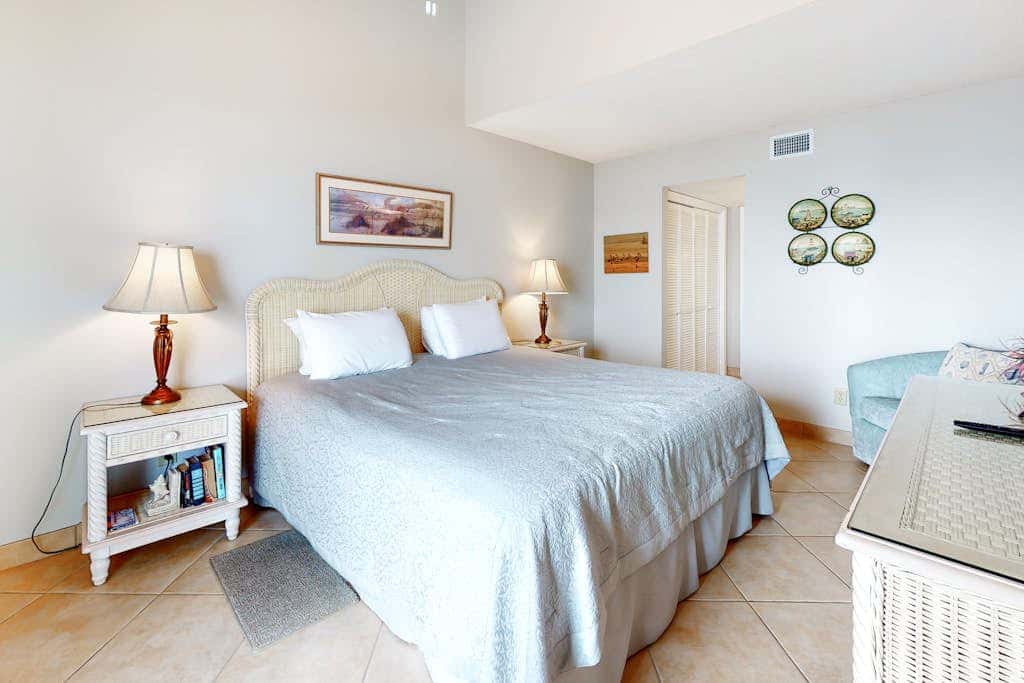 Two-story, Gulf-front condo with a pool, WiFi, washer,dryer, & central AC