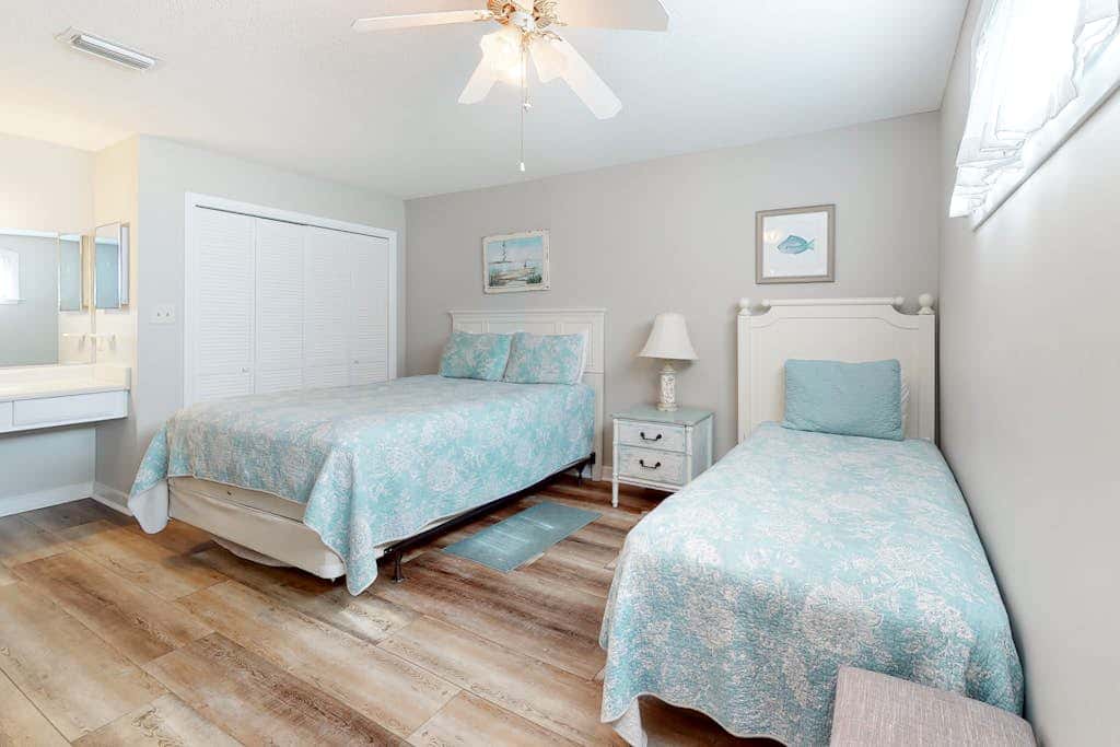 Two-story, Gulf-front condo with a pool, WiFi, washer,dryer, & central AC
