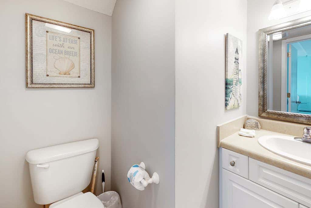 Two-story, Gulf-front condo with a pool, WiFi, washer,dryer, & central AC