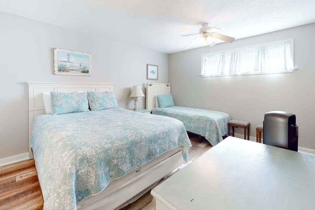 Two-story, Gulf-front condo with a pool, WiFi, washer,dryer, & central AC