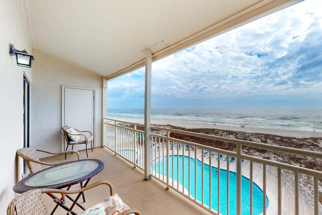 Two-story, Gulf-front condo with a pool, WiFi, washer,dryer, & central AC