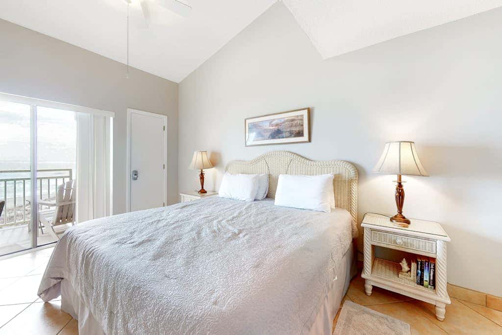 Two-story, Gulf-front condo with a pool, WiFi, washer,dryer, & central AC