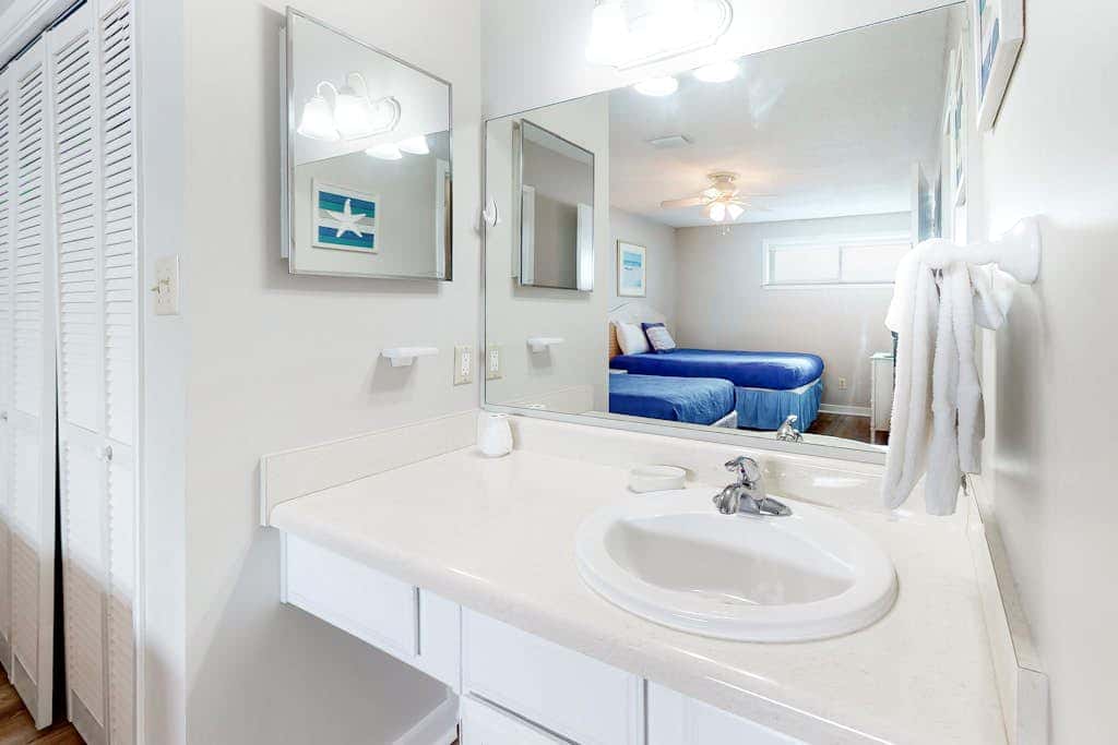 Two-story, Gulf-front condo with a pool, WiFi, washer,dryer, & central AC