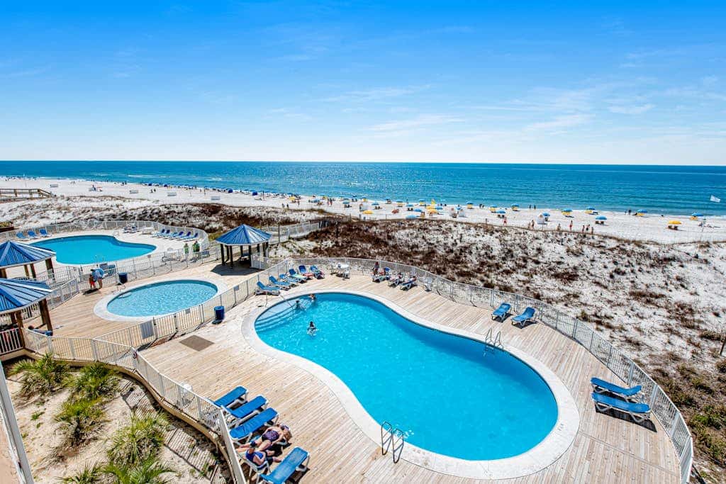 Two-story, Gulf-front condo with a pool, WiFi, washer,dryer, & central AC
