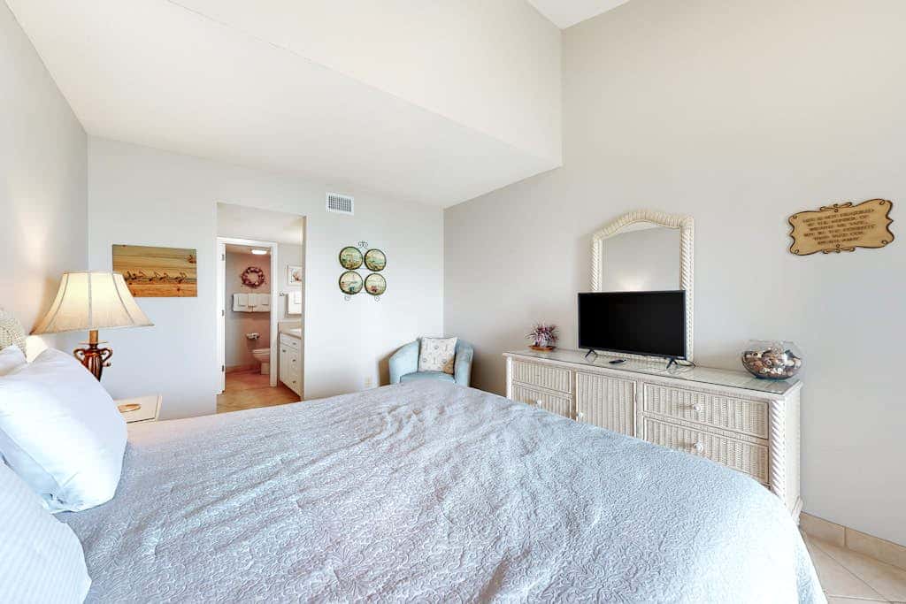Two-story, Gulf-front condo with a pool, WiFi, washer,dryer, & central AC