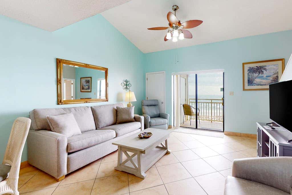 Two-story, Gulf-front condo with a pool, WiFi, washer,dryer, & central AC