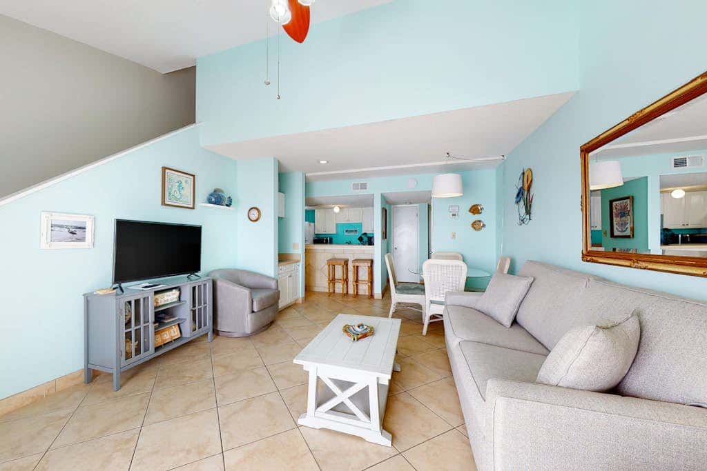 Two-story, Gulf-front condo with a pool, WiFi, washer,dryer, & central AC