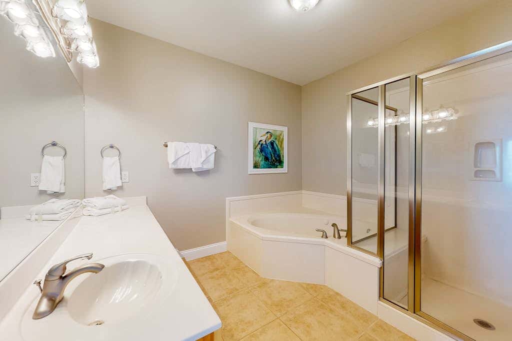 Large beachfront home with pool, deck & AC - wedding-friendly