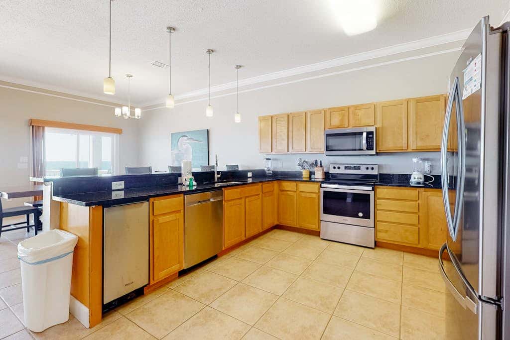 Large beachfront home with pool, deck & AC - wedding-friendly