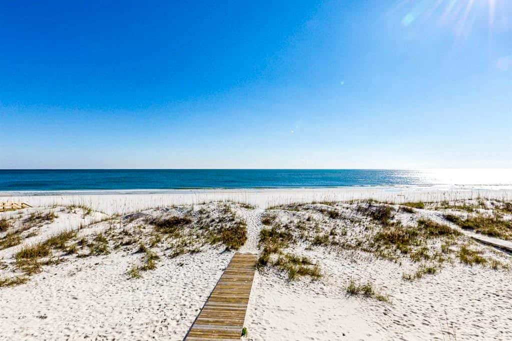 Large beachfront home with pool, deck & AC - wedding-friendly