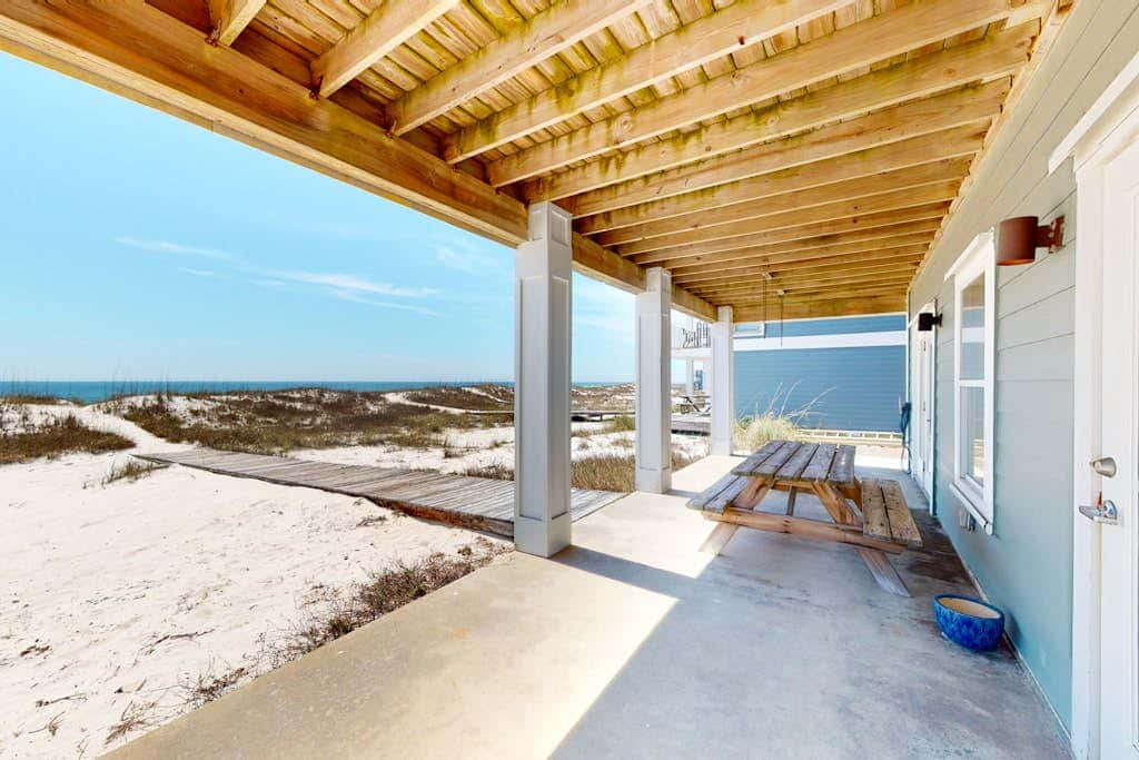 Large beachfront home with pool, deck & AC - wedding-friendly