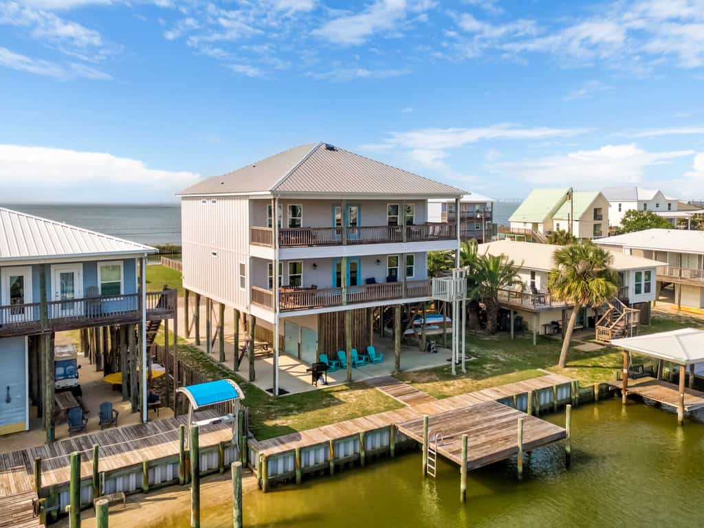 Waterfront home with private grill, dock, and washer & dryer