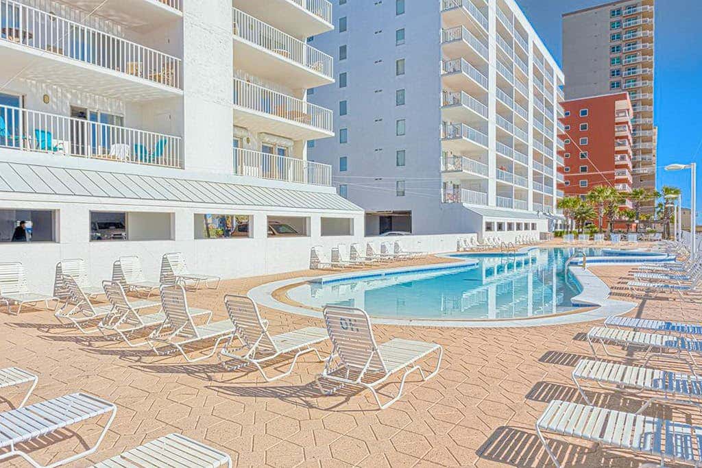 Gulf-front condo with beach views, balcony, central AC & pool