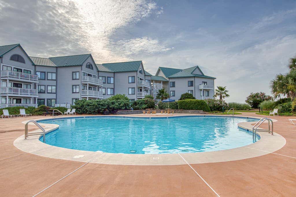 Waterfront condo with pool & hot tub