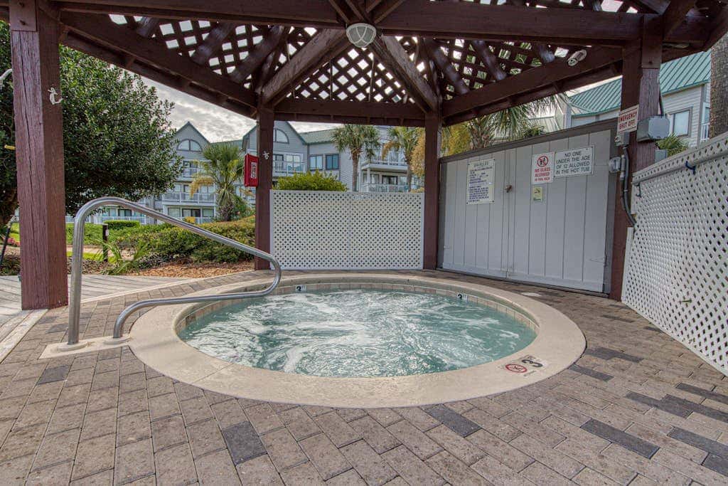 Waterfront condo with pool & hot tub