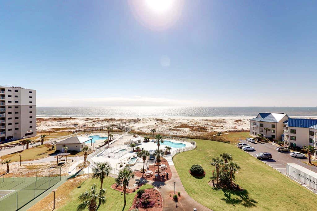 Condo with Gulf-facing balcony, shared pool, hot tub, gym