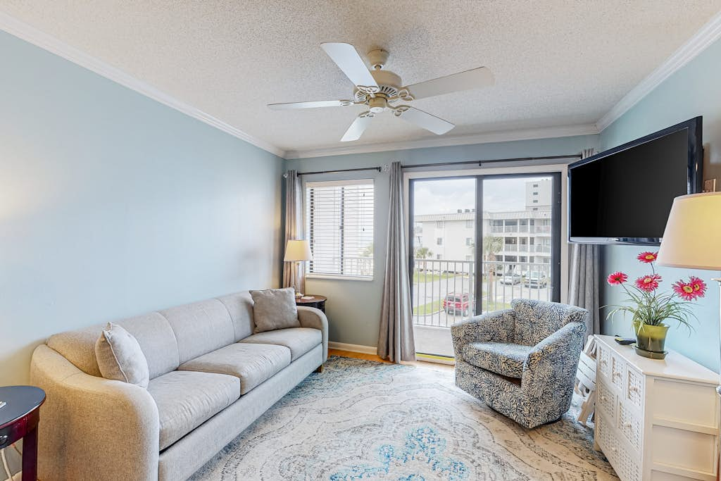 Second-floor ocean view condo with WiFi, shared pools, central AC, & shared W&D