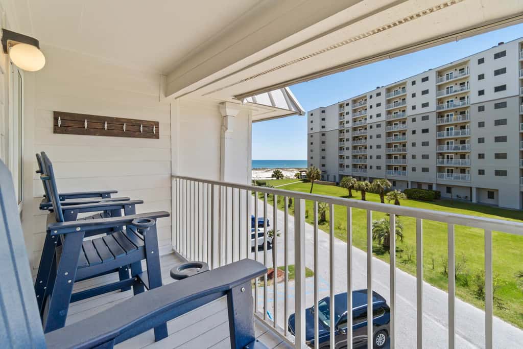 Third-floor condo with pool, hot tub, partial ocean view, gym, & central AC