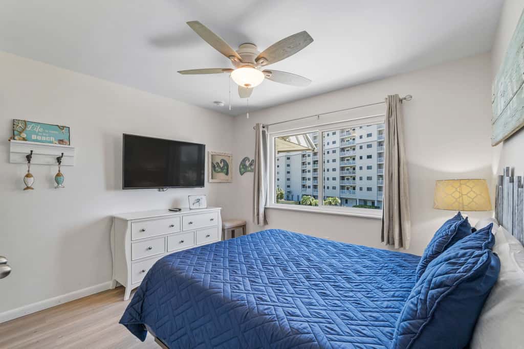 Third-floor condo with pool, hot tub, partial ocean view, gym, & central AC