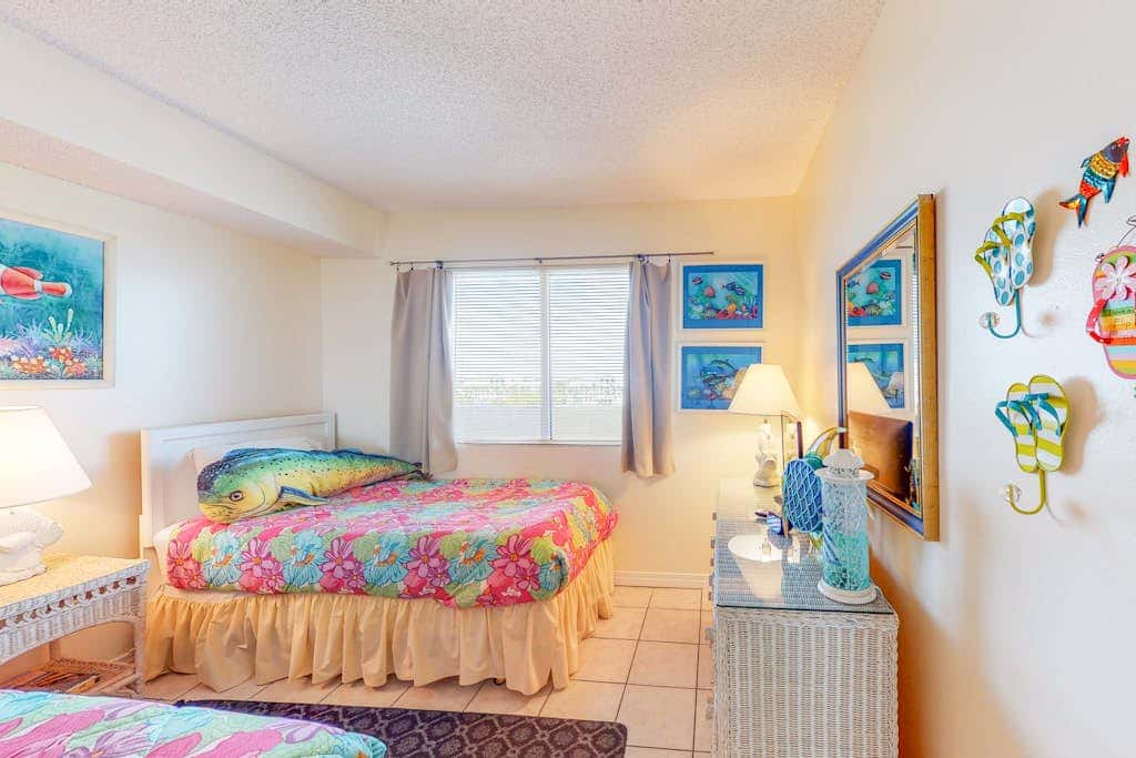 Oceanfront condo with Gulf-view balcony, beach access, pool, WiFi, & central AC