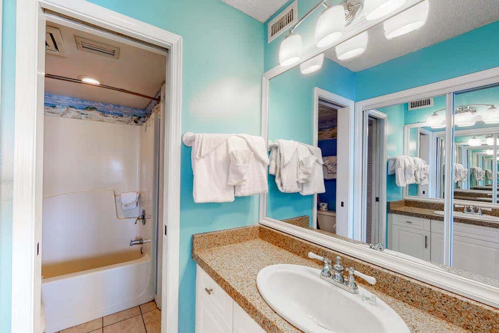 Oceanfront condo with Gulf-view balcony, beach access, pool, WiFi, & central AC