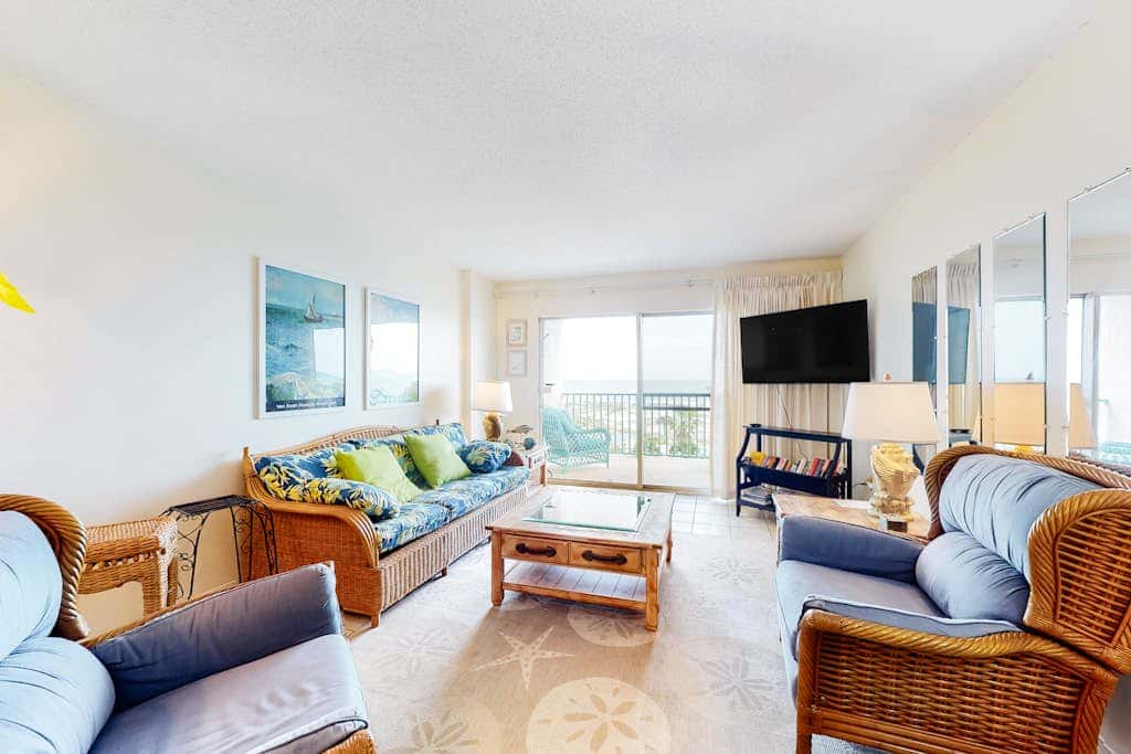 Oceanfront condo with Gulf-view balcony, beach access, pool, WiFi, & central AC