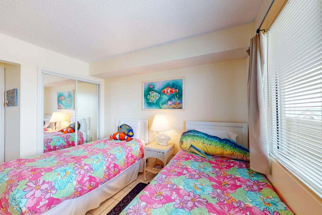 Oceanfront condo with Gulf-view balcony, beach access, pool, WiFi, & central AC