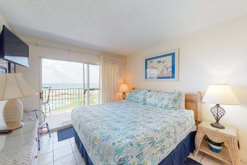 Oceanfront condo with Gulf-view balcony, beach access, pool, WiFi, & central AC