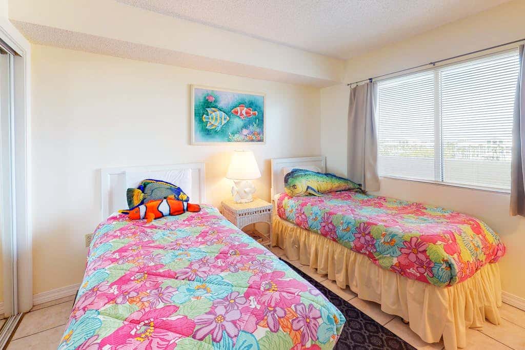 Oceanfront condo with Gulf-view balcony, beach access, pool, WiFi, & central AC