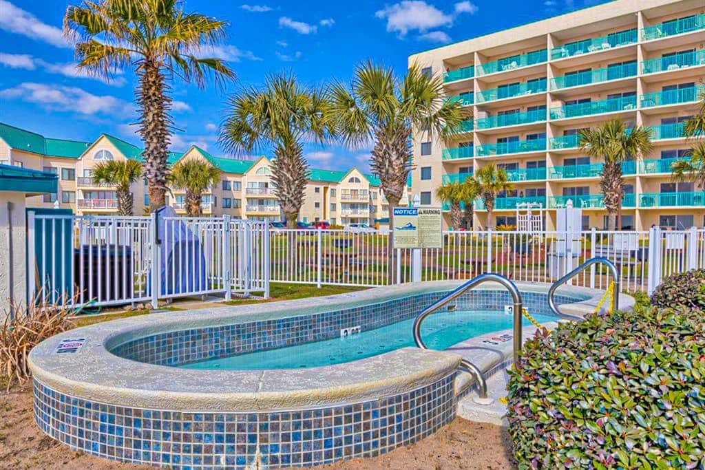 Oceanfront condo with Gulf-view balcony, beach access, pool, WiFi, & central AC