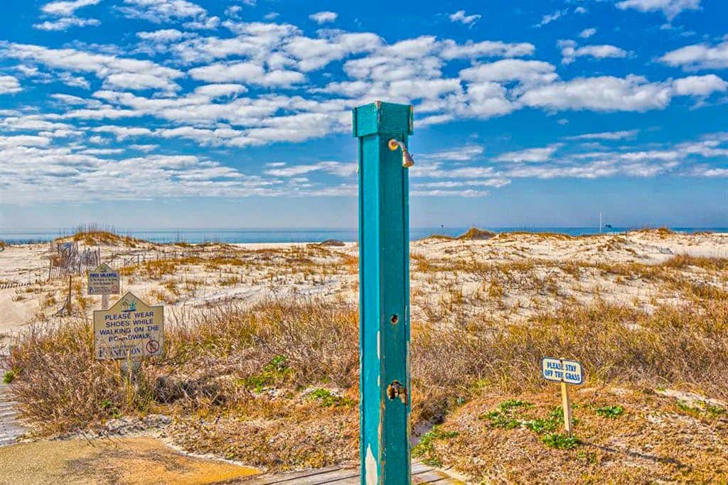 Oceanfront condo with Gulf-view balcony, beach access, pool, WiFi, & central AC
