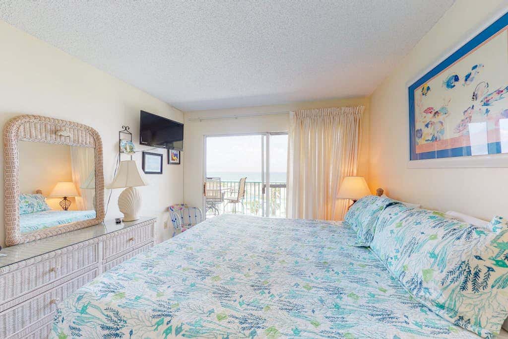 Oceanfront condo with Gulf-view balcony, beach access, pool, WiFi, & central AC