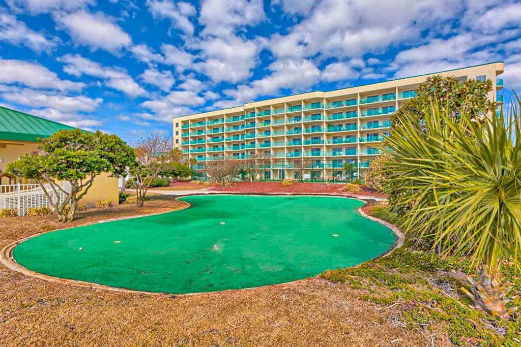 Oceanfront condo with Gulf-view balcony, beach access, pool, WiFi, & central AC