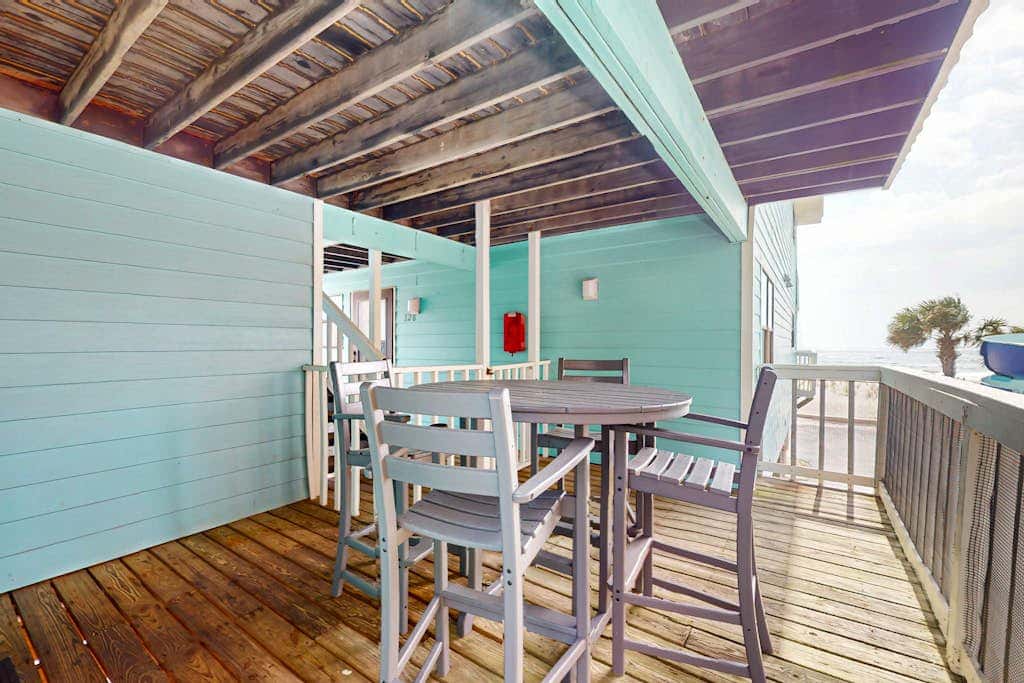 Waterfront condo with a furnished balcony, peek-a-boo Gulf views, & shared pools