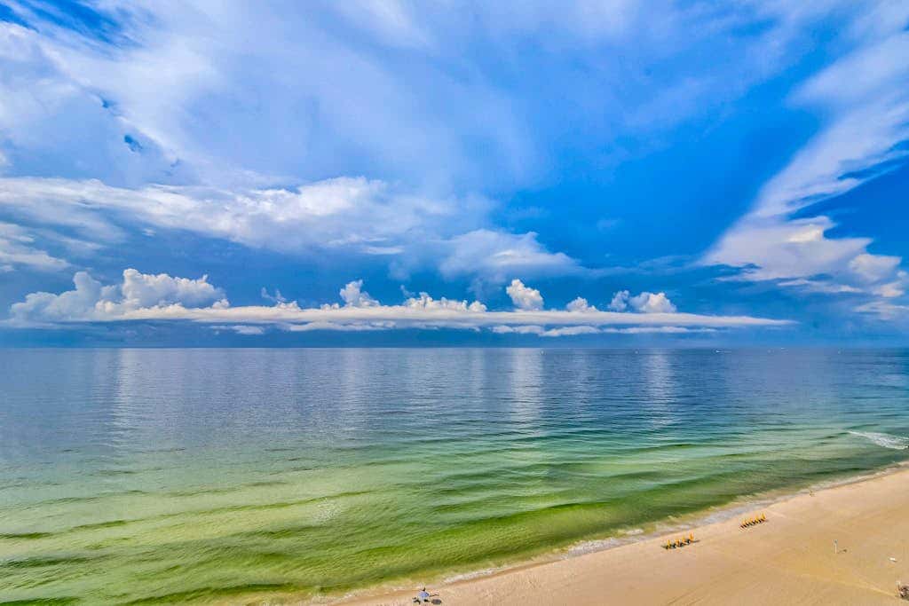 Bright & breezy condo with Gulf view, pools & beach access