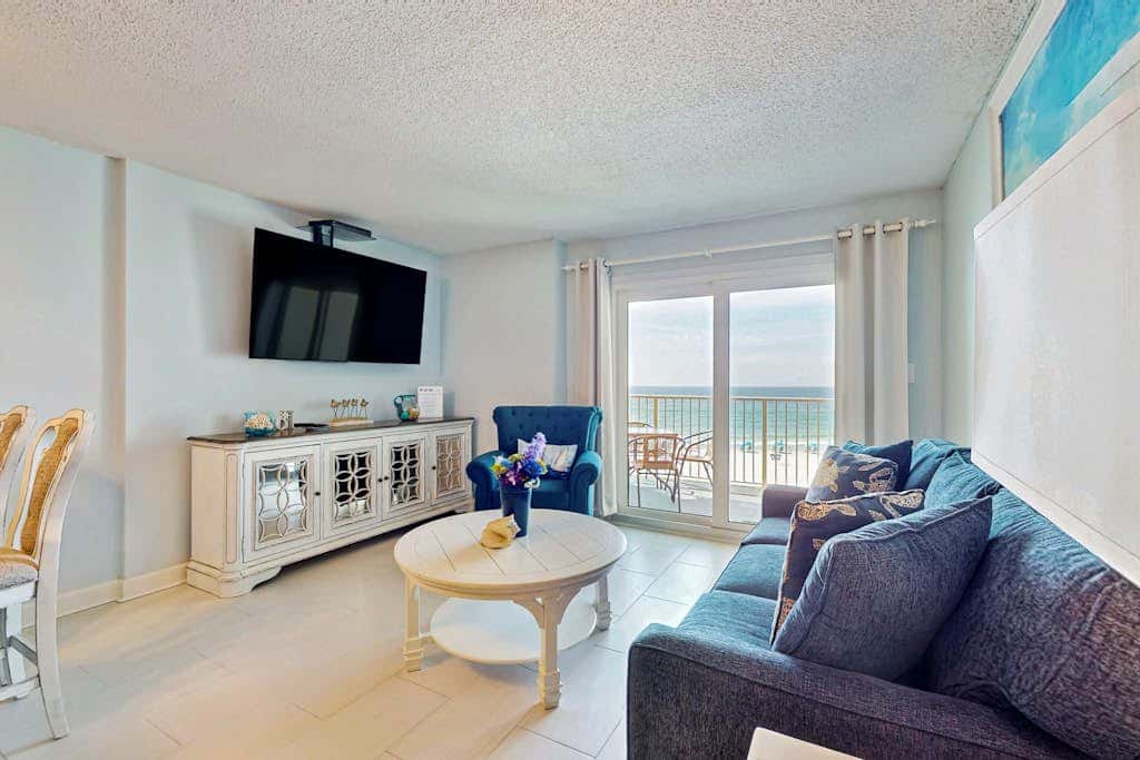 Gulf-front 3rd-floor condo with outdoor pool, central AC, & balcony