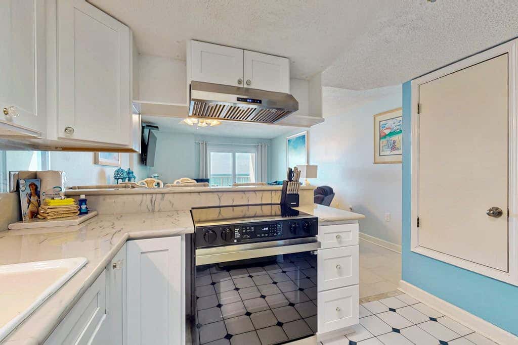 Gulf-front 3rd-floor condo with outdoor pool, central AC, & balcony