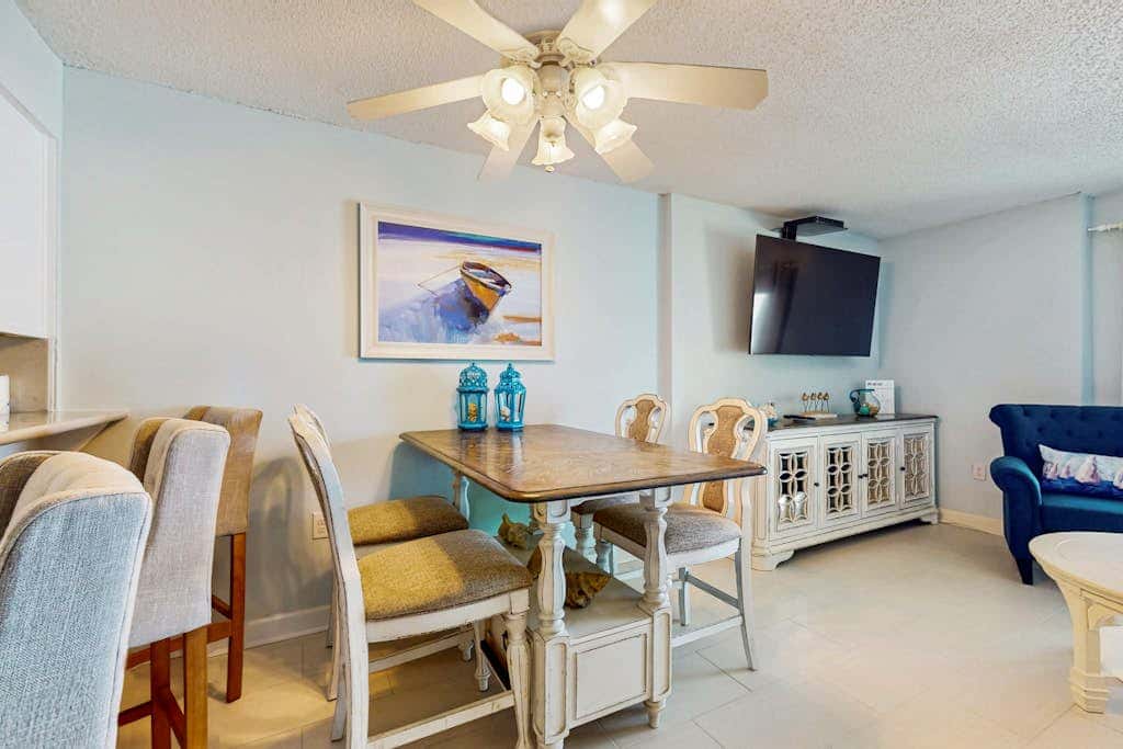 Gulf-front 3rd-floor condo with outdoor pool, central AC, & balcony