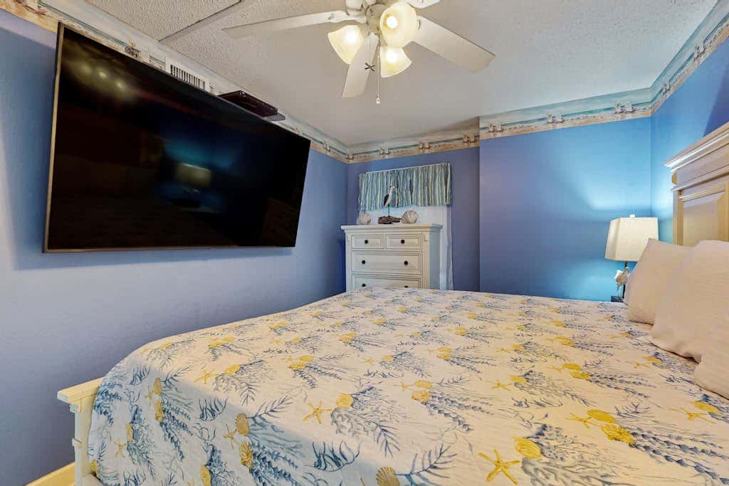 Gulf-front 3rd-floor condo with outdoor pool, central AC, & balcony