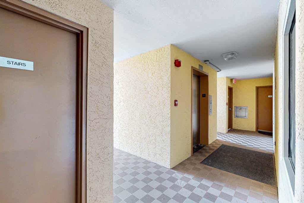 Gulf-front 3rd-floor condo with outdoor pool, central AC, & balcony