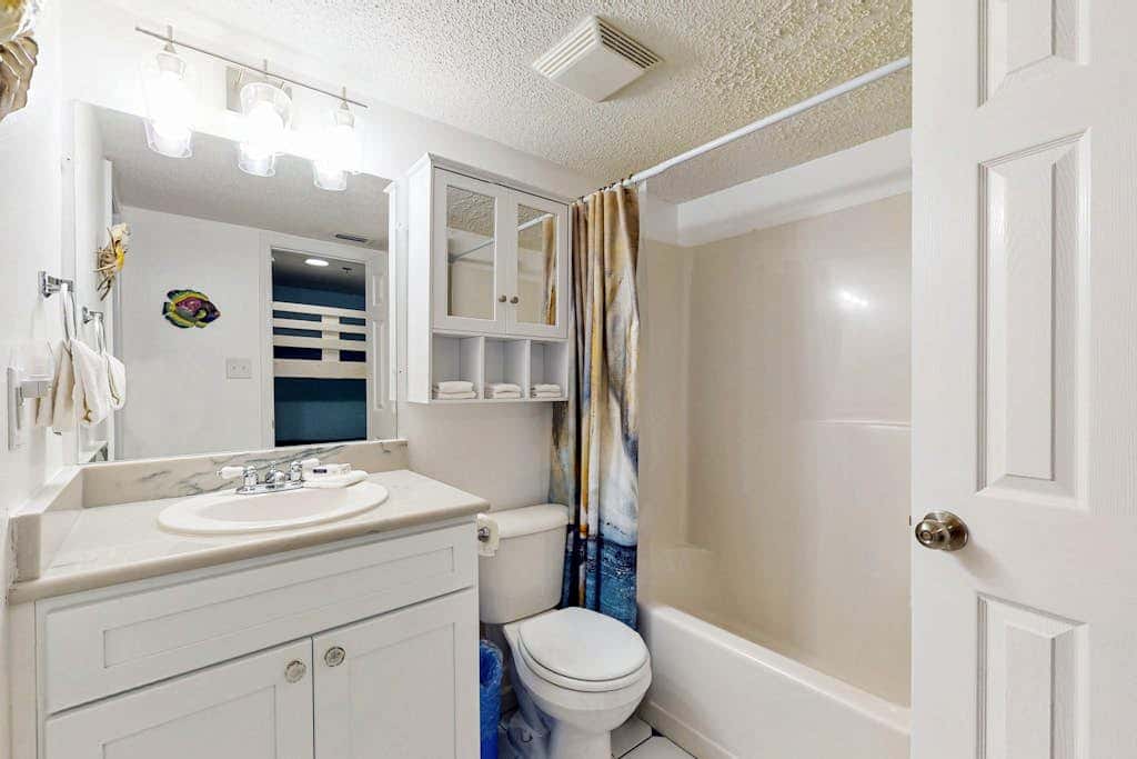 Gulf-front 3rd-floor condo with outdoor pool, central AC, & balcony