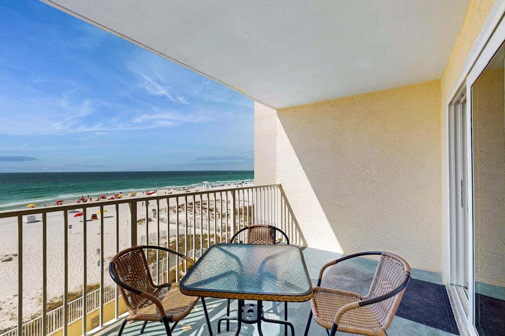 Gulf-front 3rd-floor condo with outdoor pool, central AC, & balcony
