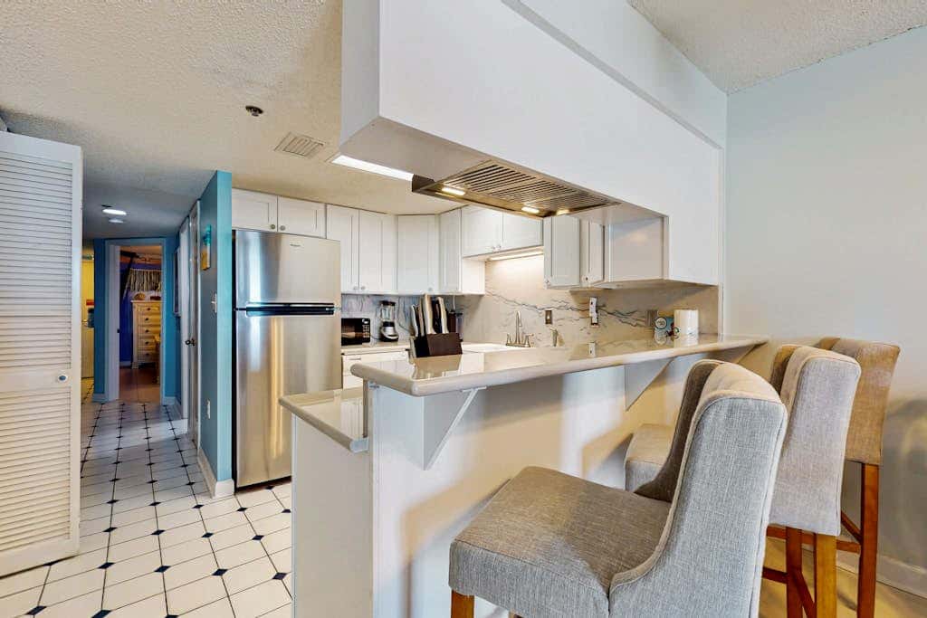 Gulf-front 3rd-floor condo with outdoor pool, central AC, & balcony