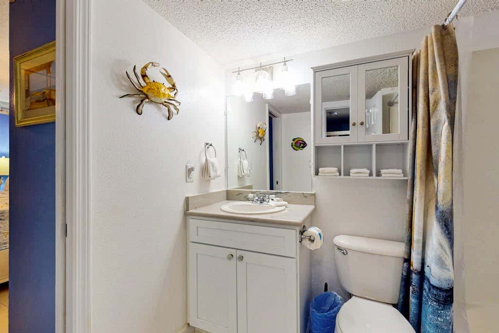Gulf-front 3rd-floor condo with outdoor pool, central AC, & balcony