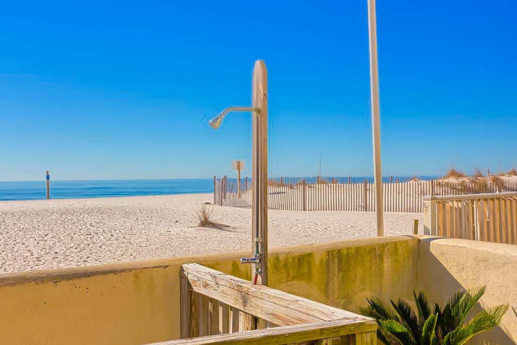 Gulf-front 3rd-floor condo with outdoor pool, central AC, & balcony
