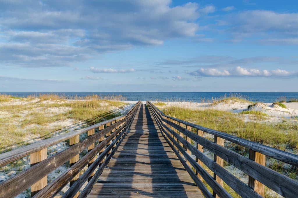 Clearwater condo with bunk room, pool, & balcony - walk to waves