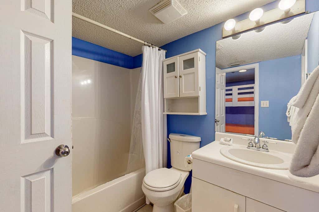 Clearwater condo with bunk room, pool, & balcony - walk to waves