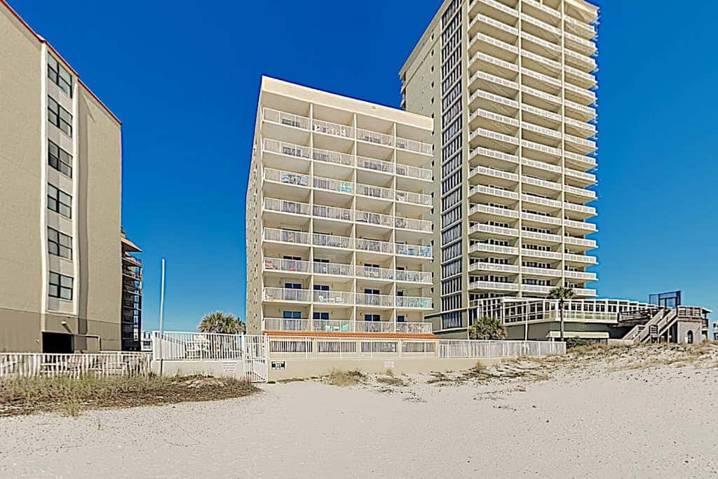 Clearwater condo with bunk room, pool, & balcony - walk to waves